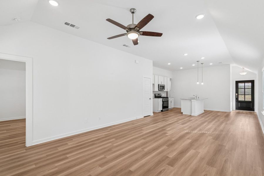 Spacious, unfurnished interior of a new home in Pinewood at Grand Texas, New Caney (Image 11).