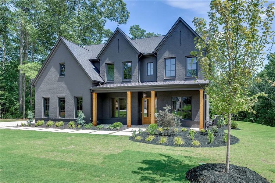Front exterior of a new home in , Buford, GA, highlighting curb appeal (Image 33).
