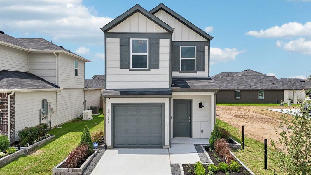 Representative exterior photo of a completed home built from the Dillon by D.R. Horton in The Villas at Legacy Park, Houston, TX (Image 24).