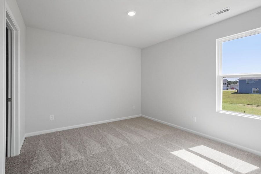 Spacious, unfurnished interior of a new home in Cambridge Reserve, Angier (Image 27).
