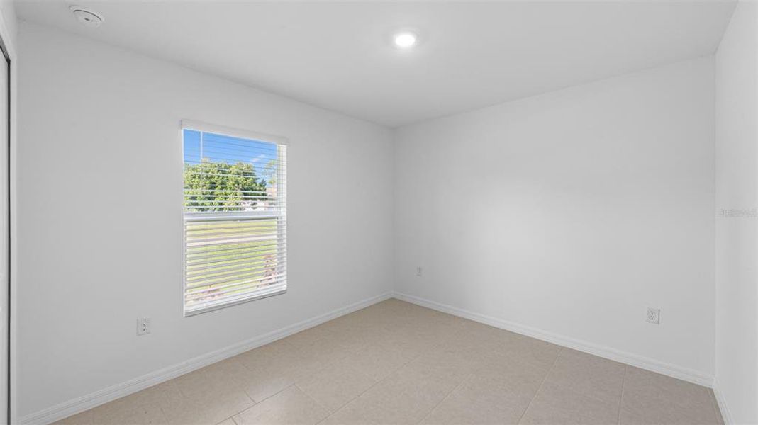Spacious, unfurnished interior of a new home in , Port Charlotte (Image 24).