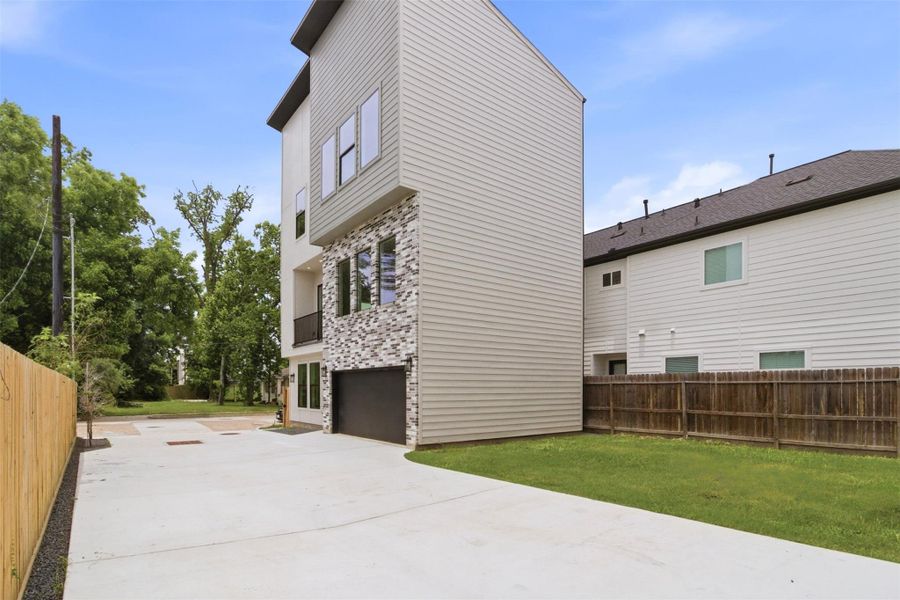 Exterior details and patio area of a home in , Houston (Image 4).