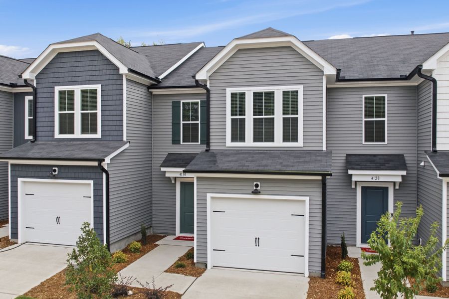 Front exterior of a new home in Carpenter Falls, Durham, NC, highlighting curb appeal (Image 17).