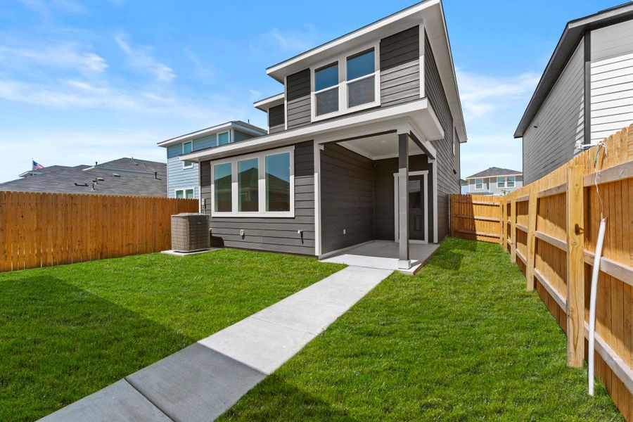 Exterior details and patio area of a home in Valverde, Bastrop (Image 4).