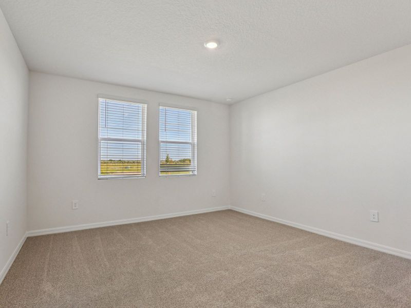 Spacious, unfurnished interior of a new home in Springs at Lake Alfred - Classic Series, Lake Alfred (Image 10).