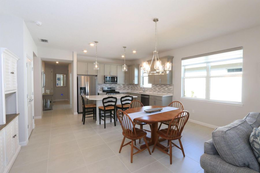Furnished interior view inside a new home in Del Webb Tradition, Port St. Lucie (Image 32).
