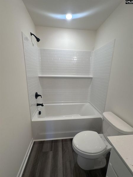 Furnished interior view inside a new home in Piney Woods Bluff, Columbia (Image 2).