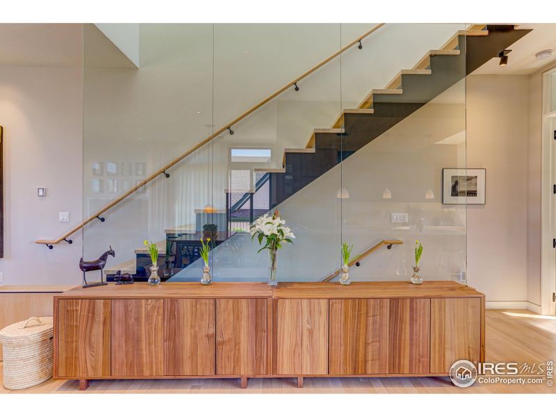 *Similar floor plan, finishes and feel at L'Avenir!  Not of the actual build.  Full glass wall, white oak floors - architecturally stunning - floating staircase.  Smooth wall texture, 10 FT ceilings on the living level!