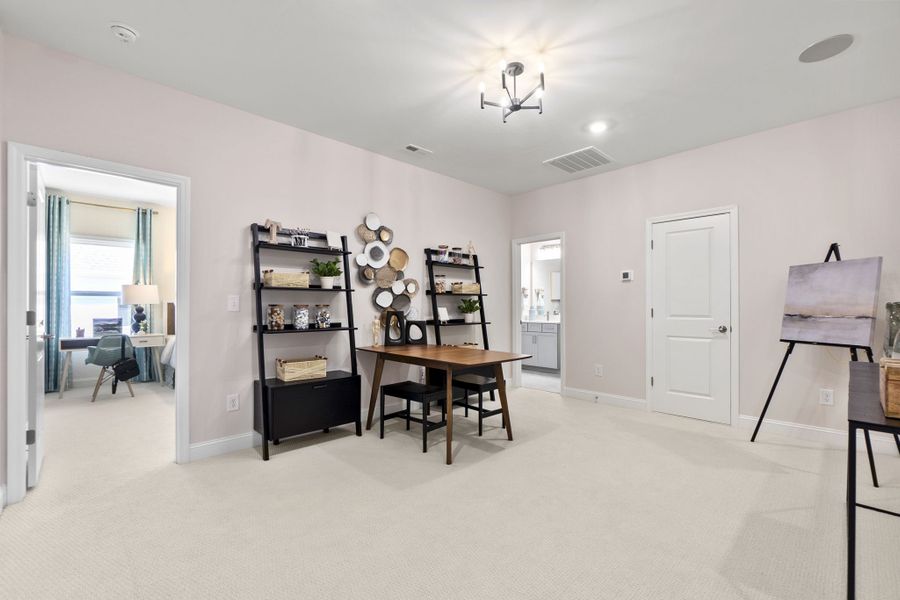 Representative furnished interior of a home built from the Whitmore II by Taylor Morrison in Tramore, Harrisburg (Image 23).
