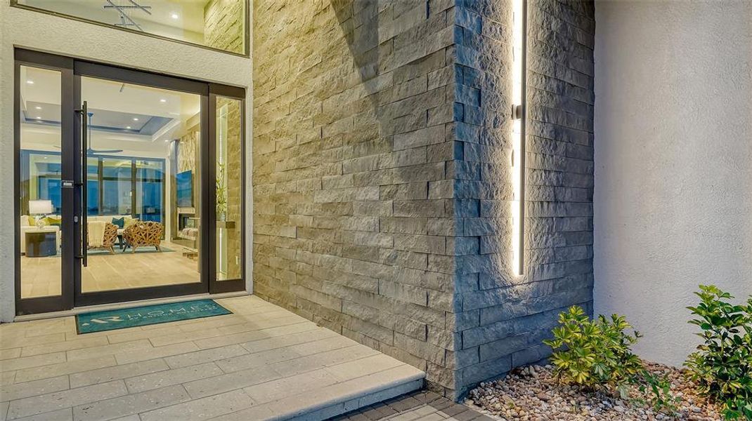 Exterior details and patio area of a home in Wild Blue at Waterside, Sarasota (Image 3).