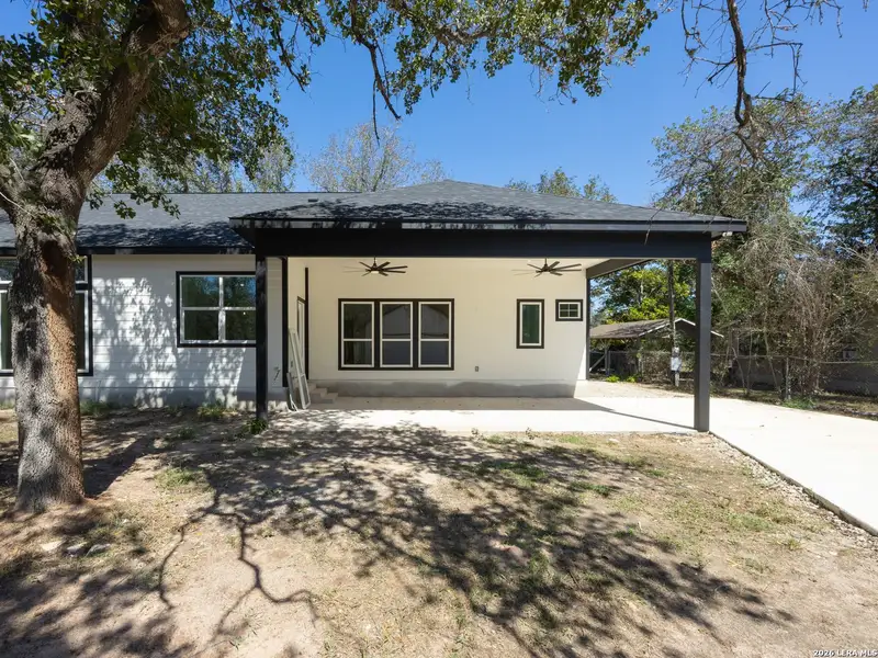 Exterior details and patio area of a home in , Elmendorf (Image 3).