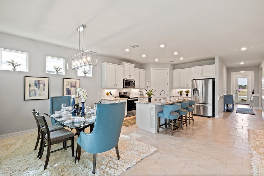 Representative furnished interior of a home built from the Delray by D.R. Horton in Coral Bay - Express & Tradition, North Fort Myers (Image 7).