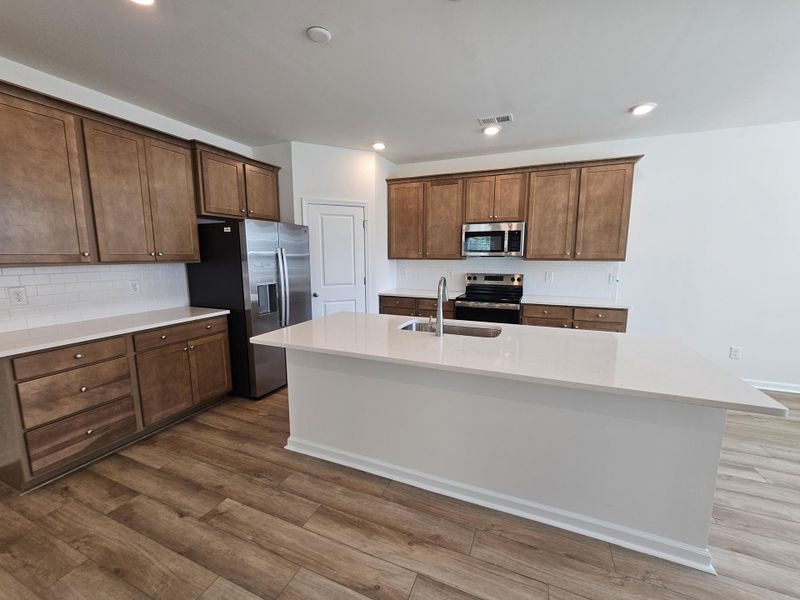 Furnished interior view inside a new home in Creekside at Andrews, Summerville (Image 7).