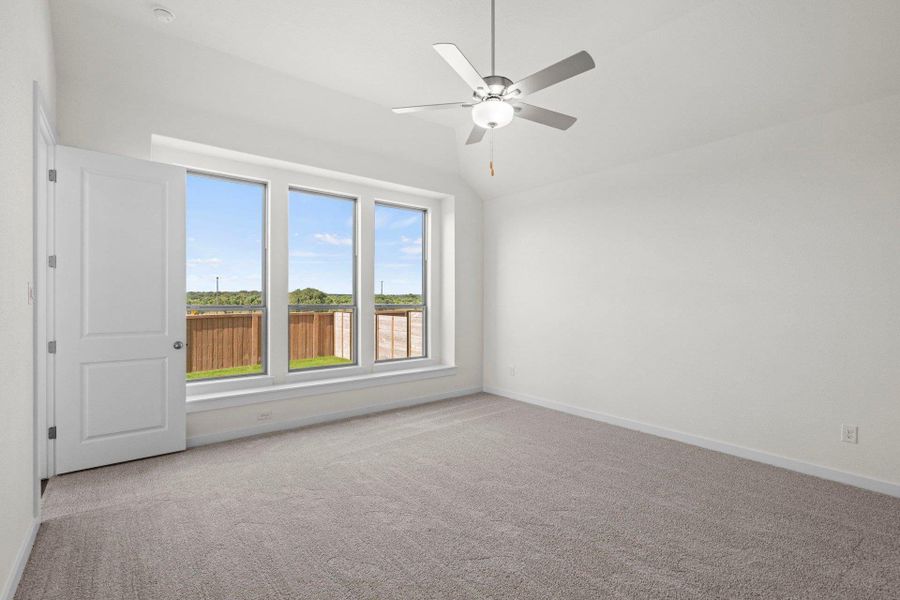 Primary Bedroom with elevated ceiling