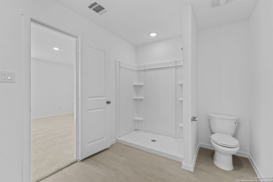 Furnished interior view inside a new home in Lodi Grove, Floresville (Image 5).