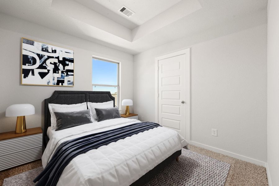A spacious secondary bedroom with clean lines, neutral colors, and a bright window view, offering comfort and versatility for any lifestyle. A spacious secondary bedroom with clean lines, neutral colors, and a bright window view, offering comfort and versatility for any lifestyle.