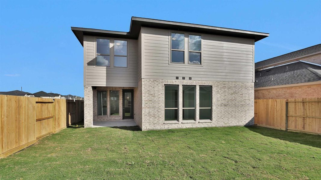 Exterior details and patio area of a home in Cross Creek West 45', Fulshear (Image 3). Exterior details and patio area of a home in Cross Creek West 45', Fulshear (Image 3).