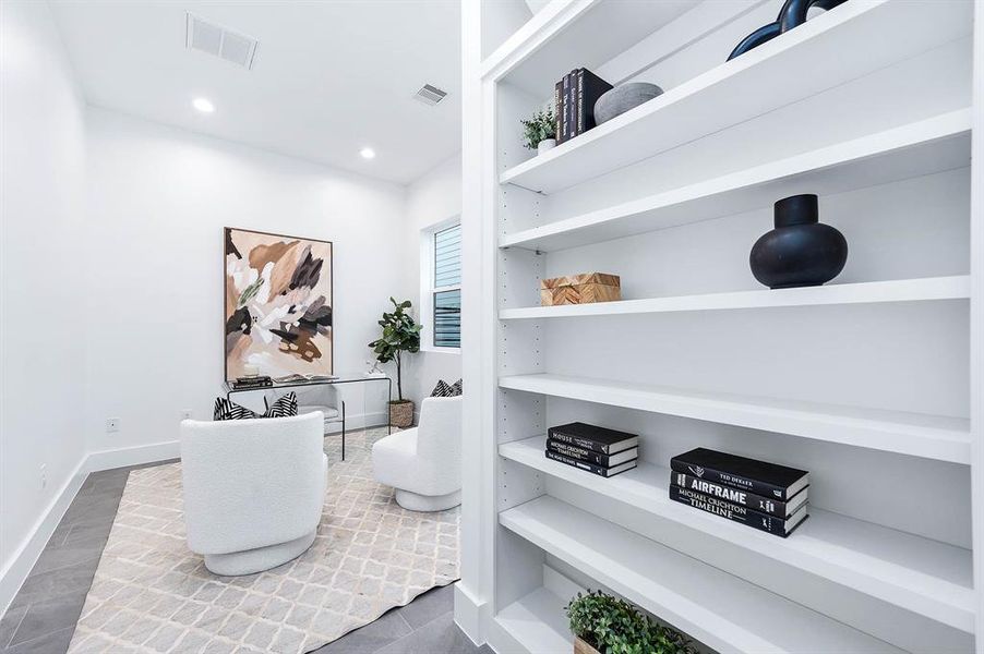 Study entrance with custom built-in bookshelves.