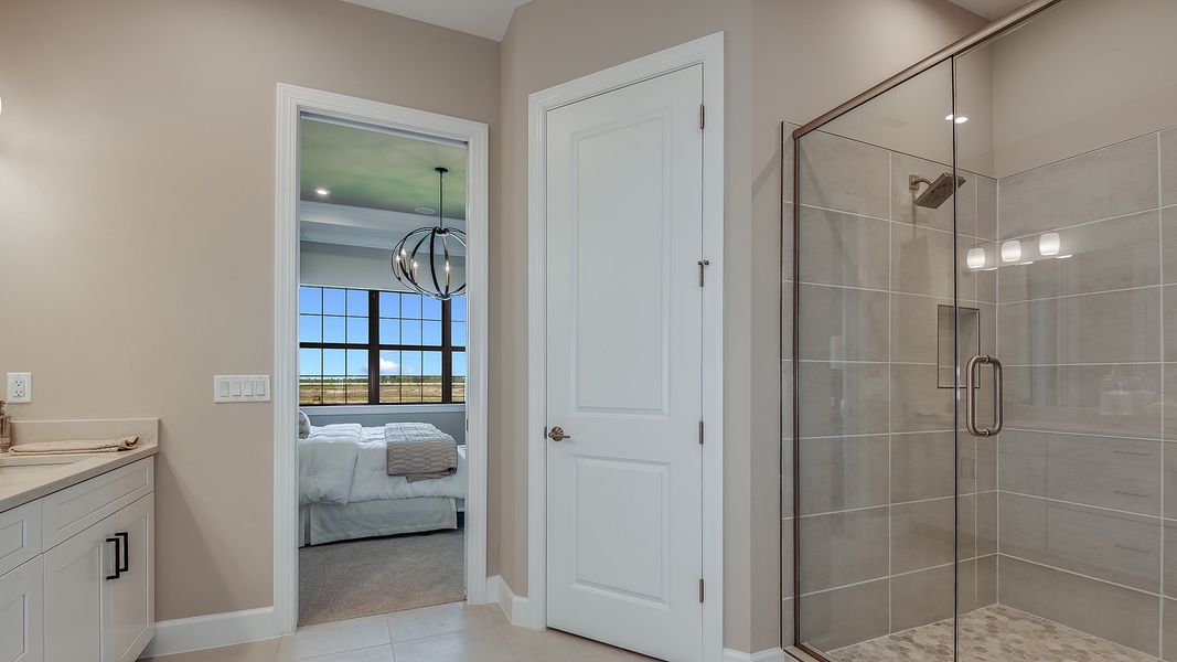 Furnished interior view inside a new home in Esplanade by the Islands Coach Homes, Naples (Image 12). Furnished interior view inside a new home in Esplanade by the Islands Coach Homes, Naples (Image 12).