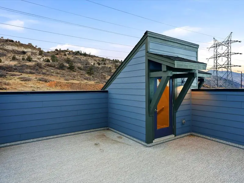 Exterior details and patio area of a home in Three Hills, Morrison (Image 4).