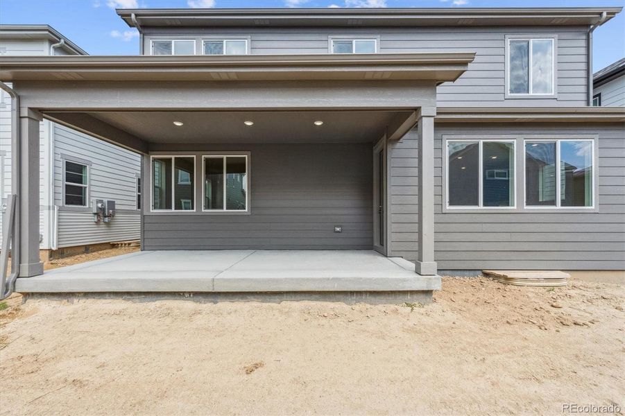 Front exterior of a new home in Floret Collection at Parkdale Commons, Lafayette, CO, highlighting curb appeal (Image 20).