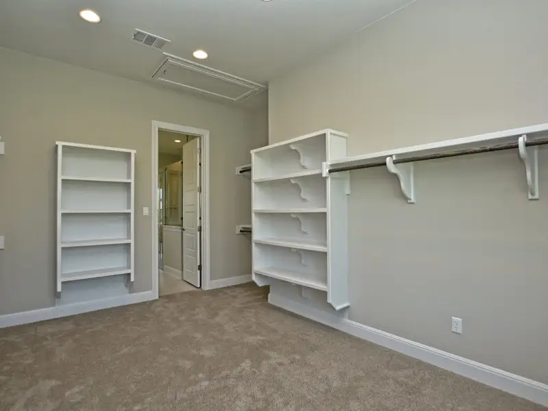Representative unfurnished interior of a home built from the Santa Barbara II by Giddens Homes in Scofield Farms Estates, Georgetown (Image 109).