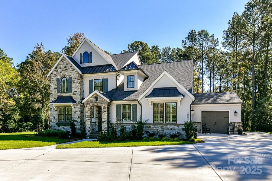Front exterior of a new home in , Weddington, NC, highlighting curb appeal (Image 2).