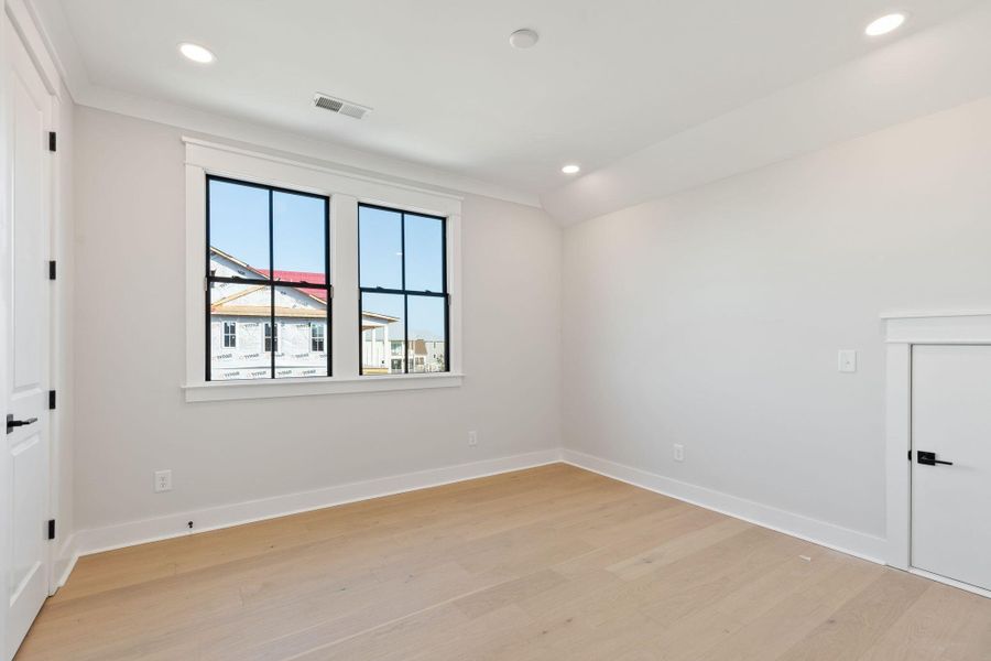 Spacious, unfurnished interior of a new home in Rivercroft, Awendaw (Image 50).