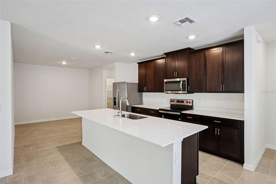 Furnished interior view inside a new home in Ridgehaven - Villas, Ormond Beach (Image 14).