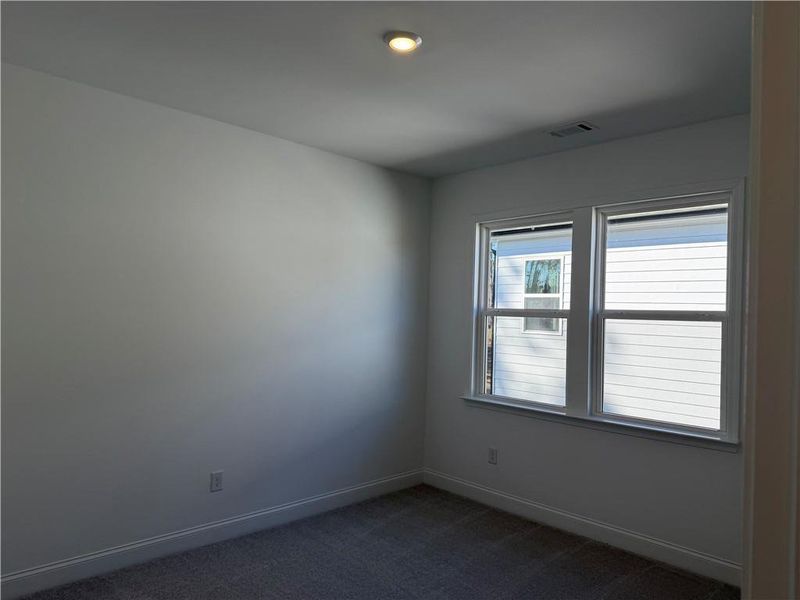 Spacious, unfurnished interior of a new home in Bennett Farm, Loganville (Image 23).