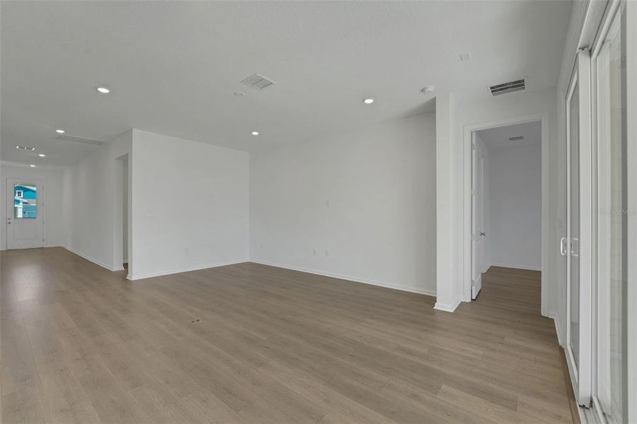 Spacious, unfurnished interior of a new home in Green Key Village, Lady Lake (Image 31).