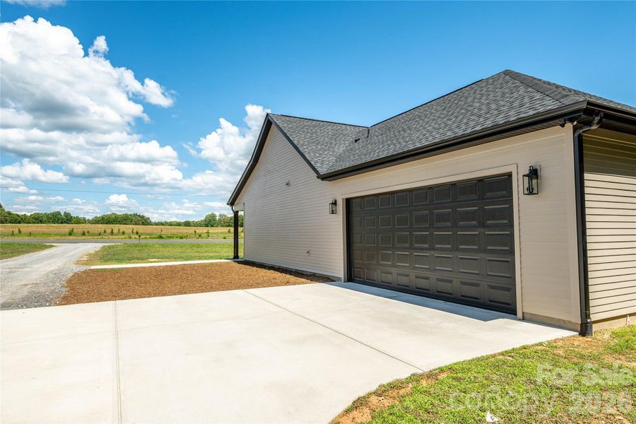 Front exterior of a new home in , Clover, SC, highlighting curb appeal (Image 2). Front exterior of a new home in , Clover, SC, highlighting curb appeal (Image 2).
