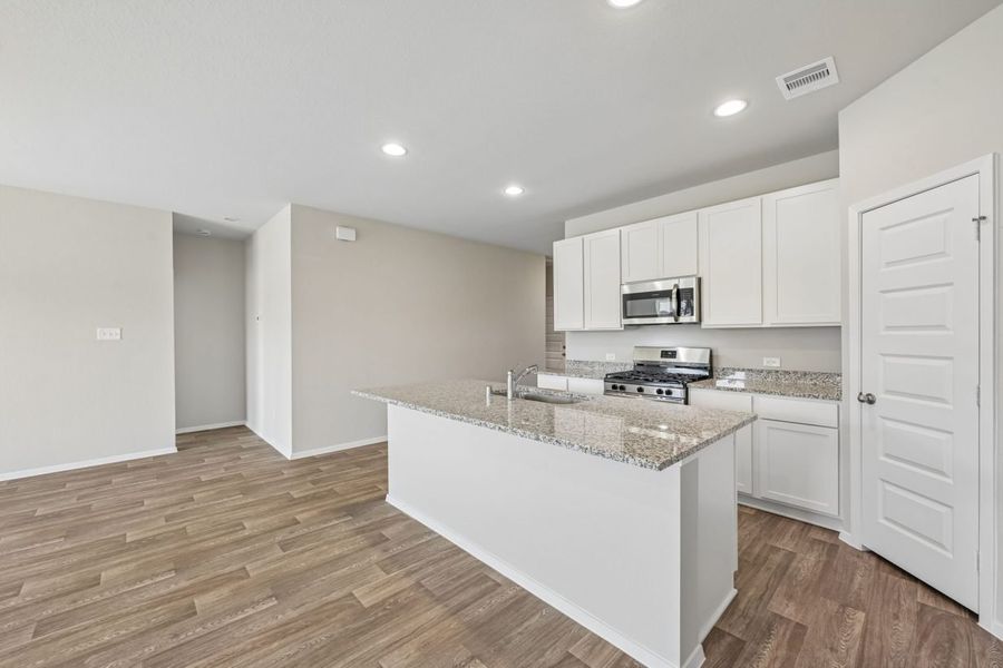 Furnished interior view inside a new home in Harrington Trails, New Caney (Image 9).