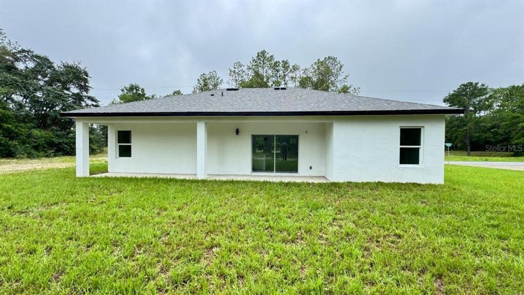 Exterior details and patio area of a home in , Citrus Springs (Image 19).