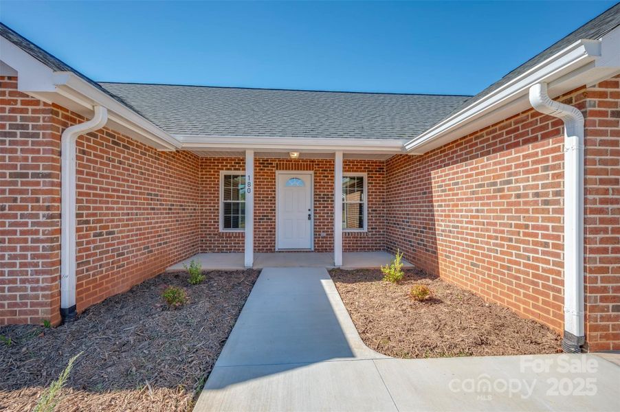 Exterior details and patio area of a home in , Spindale (Image 17).