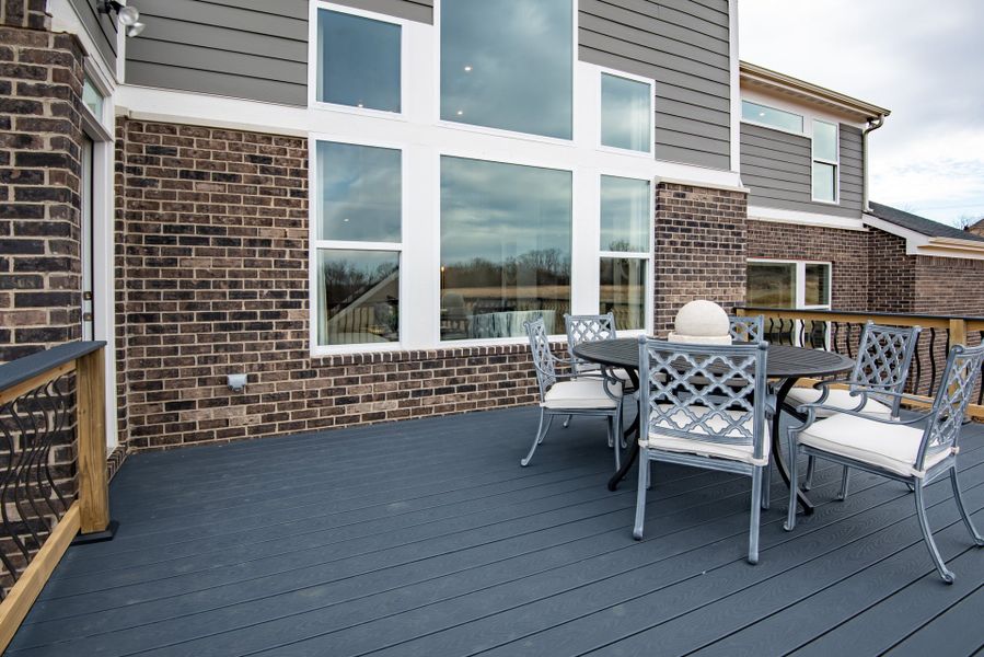 Exterior details and patio area of a home in The Estates and Meadows at Floyds Fork, Louisville (Image 3).