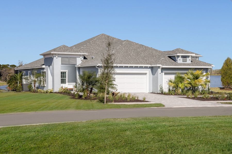 Representative exterior photo of a completed home built from the Crystal Sand 2 by Neal Communities in Wildleaf, Parrish, FL (Image 1). Representative exterior photo of a completed home built from the Crystal Sand 2 by Neal Communities in Wildleaf, Parrish, FL (Image 1).