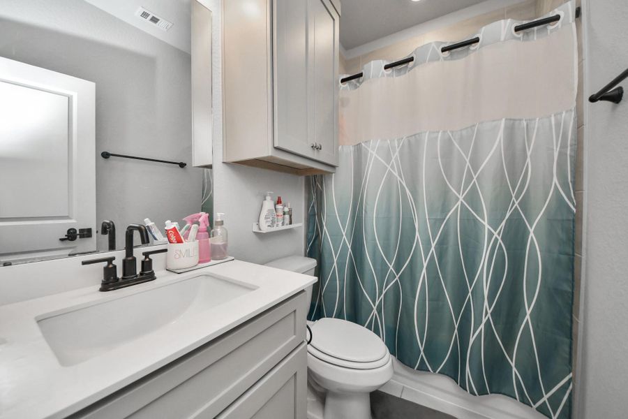 Furnished interior view inside a new home in , Conroe (Image 5).