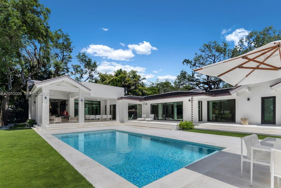 Exterior details and patio area of a home in , Coral Gables (Image 27).