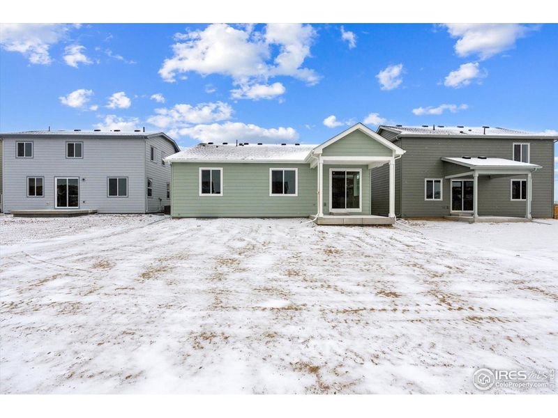 Exterior details and patio area of a home in The Overlook at Johnstown Farms, Johnstown (Image 4).