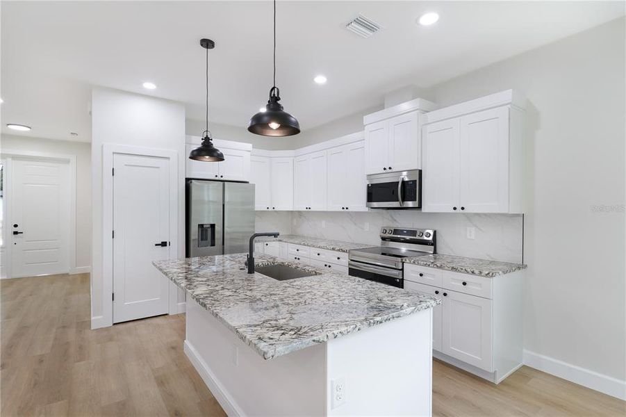 Furnished interior view inside a new home in , Port Charlotte (Image 5).