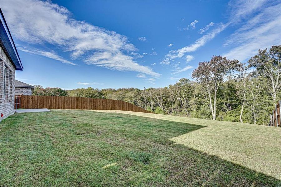 Exterior details and patio area of a home in The Grove, Sherman (Image 19). Exterior details and patio area of a home in The Grove, Sherman (Image 19).