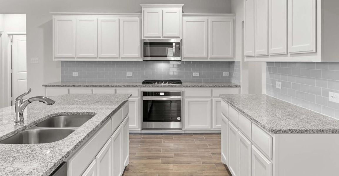 Representative exterior photo of a completed home built from the Goodrich by Impression Homes in Timberbrook, Justin, TX (Image 7).