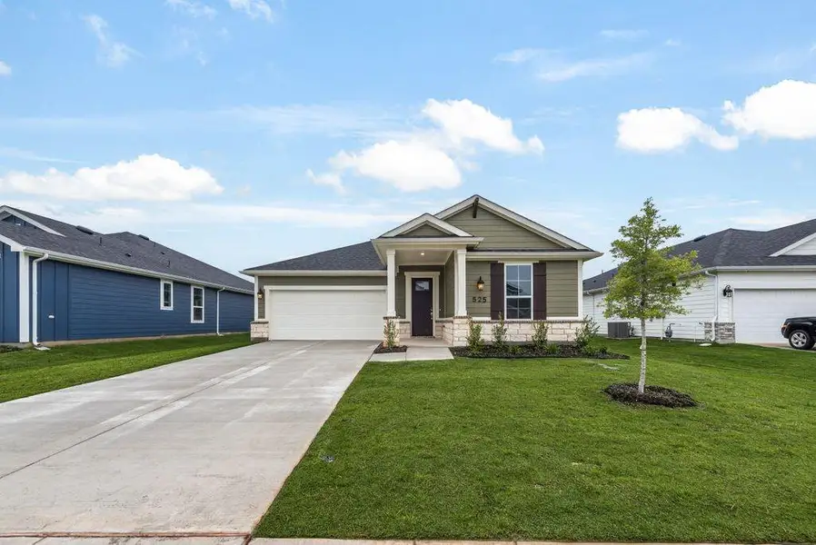 Front exterior of a new home in Creekside of Crowley, Crowley, TX, highlighting curb appeal (Image 2).