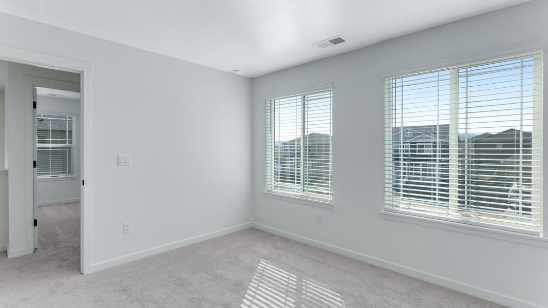Representative unfurnished interior of a home built from the Calhan by D.R. Horton in Vantage, Berthoud (Image 26).