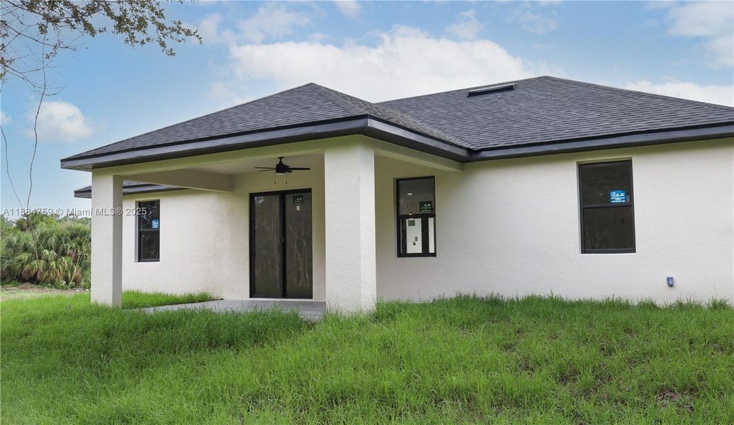 Exterior details and patio area of a home in , Lehigh Acres (Image 2).