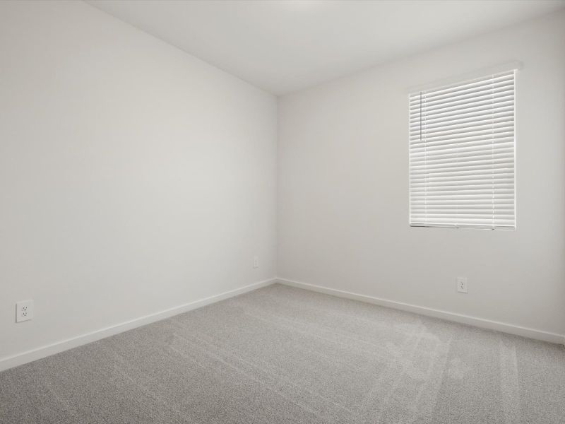 Spacious, unfurnished interior of a new home in White Tank Foothills Signature Series, Waddell (Image 12).