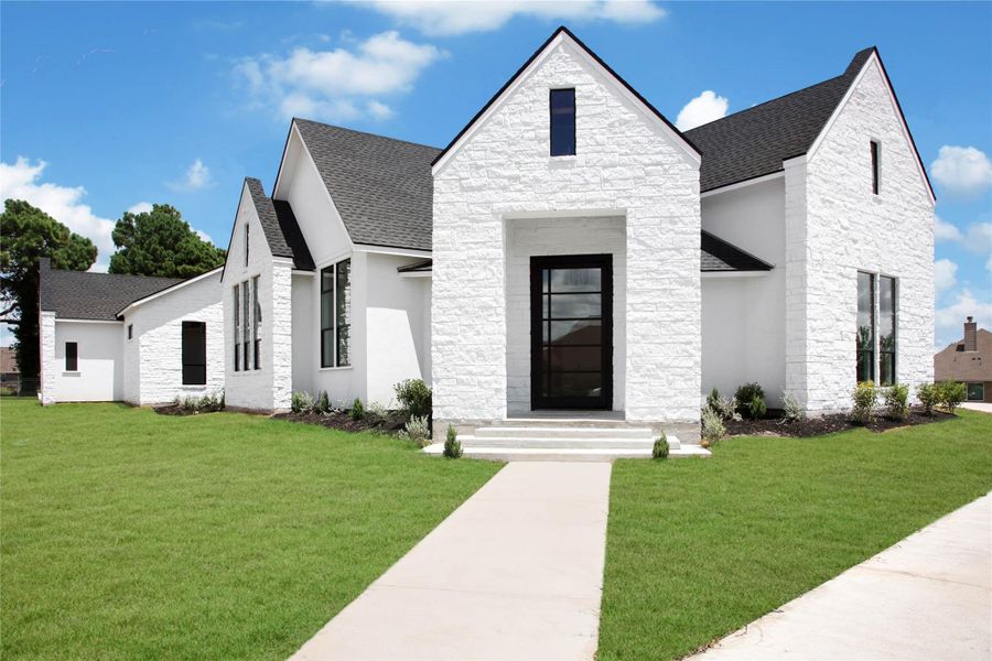 Front exterior of a new home in , Montgomery, TX, highlighting curb appeal (Image 2). Front exterior of a new home in , Montgomery, TX, highlighting curb appeal (Image 2).