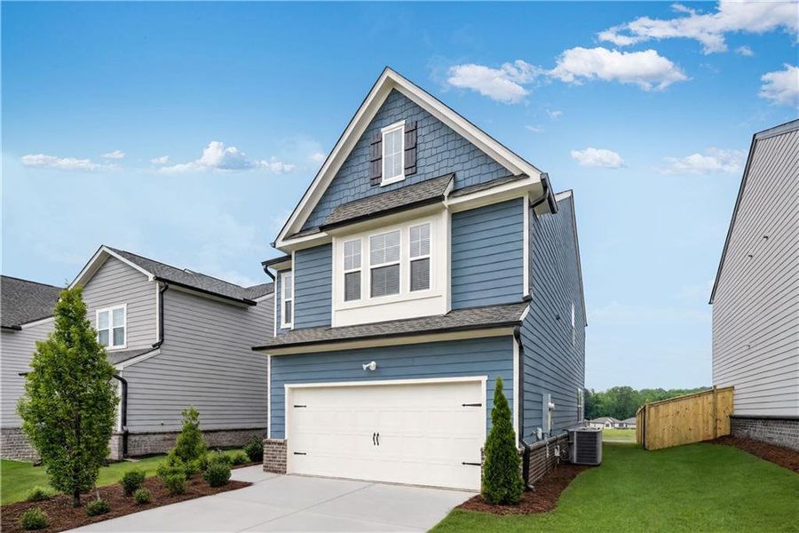 Front exterior of a new home in Timber Ridge, Douglasville, GA, highlighting curb appeal (Image 2). Front exterior of a new home in Timber Ridge, Douglasville, GA, highlighting curb appeal (Image 2).