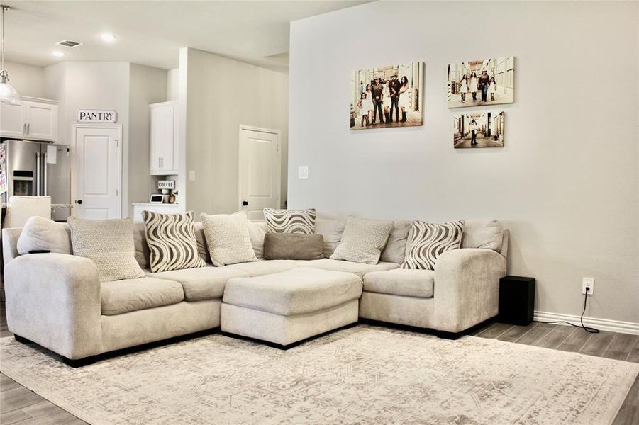 Living area featuring light style flooring and recessed lighting Living area featuring light style flooring and recessed lighting